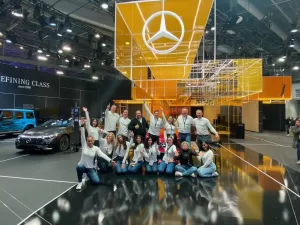 Group of Product Specialists at Mercedes-Benz display at CES during a tech event staffing success.