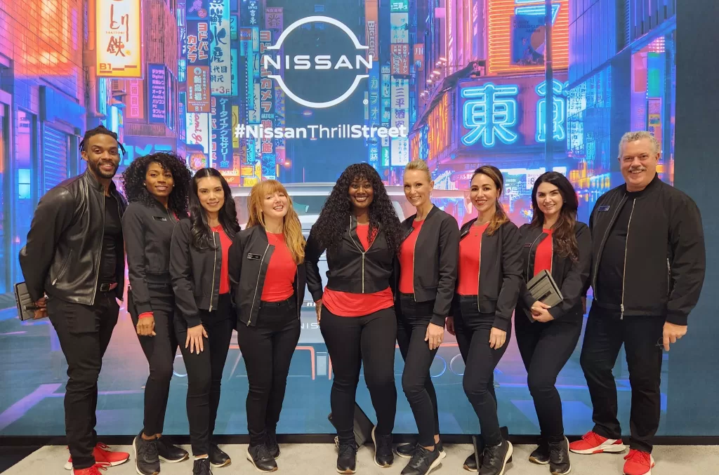 Nissan Product Specialists at an auto show represented by Productions Plus as premiere staffing agency
